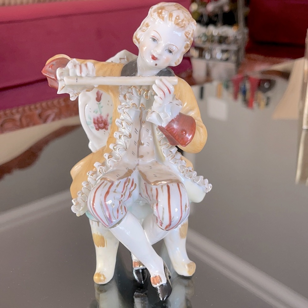 Porcelain figurine.